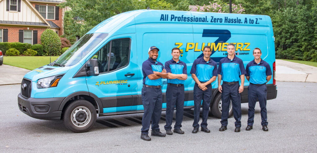 Z PLUMBERZ franchisers in front of car / Z PLUMBERZ franchise costs